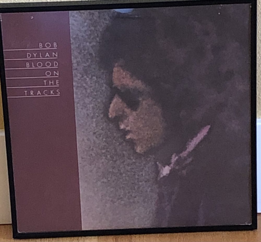 Bob Dylan “Blood on the Tracks” 13”x13” framed album cover - mint condition album is included – (Columbia) Minimum Bid: $65 (SD)